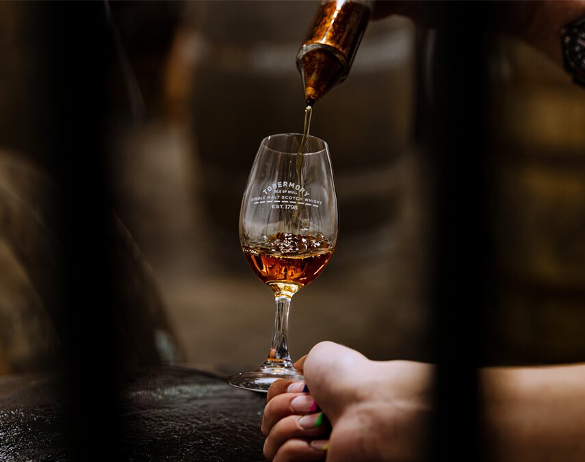 Whisky being poured into a Tobermory glass