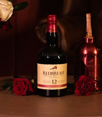 A bottle of Redbreast 12 Year Old with Bird Feeder