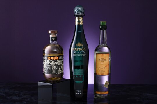 2 bottles of Tequila including Patron El Alto and Espolon and a bottle of Ilegal mezcal 