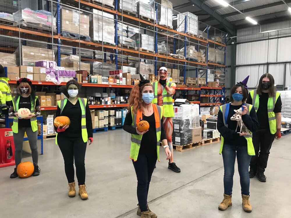 socially distanced Halloween outfits in a Master of Malt warehouse