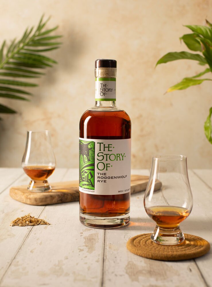 The Story Of The Roggenwolf Rye whiskey bottle with glasses