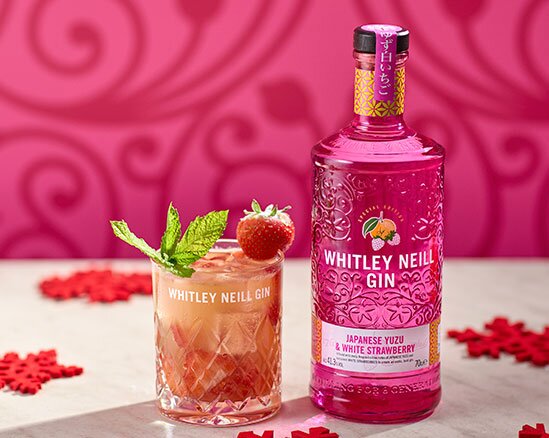 A bottle of Whitley Neill Japanese Yuzu &is  White Strawberry Gin