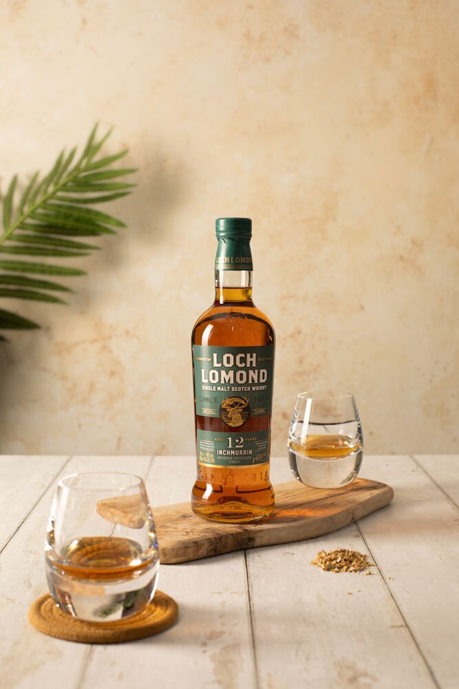 Inchmurrin 12 Year Old whisky bottle with two tumbler glasses