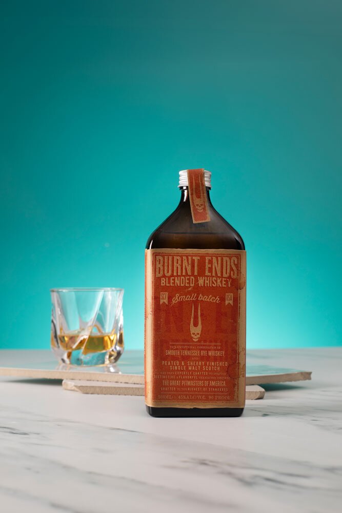 Burnt Ends Blended Whiskey bottle with glass
