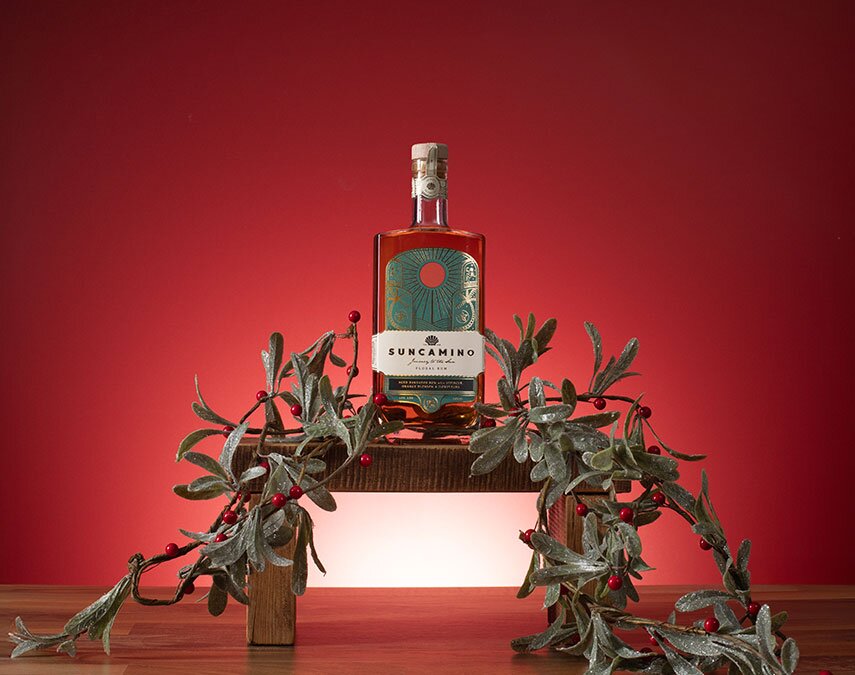 A bottle of Suncamino Floral Rum
