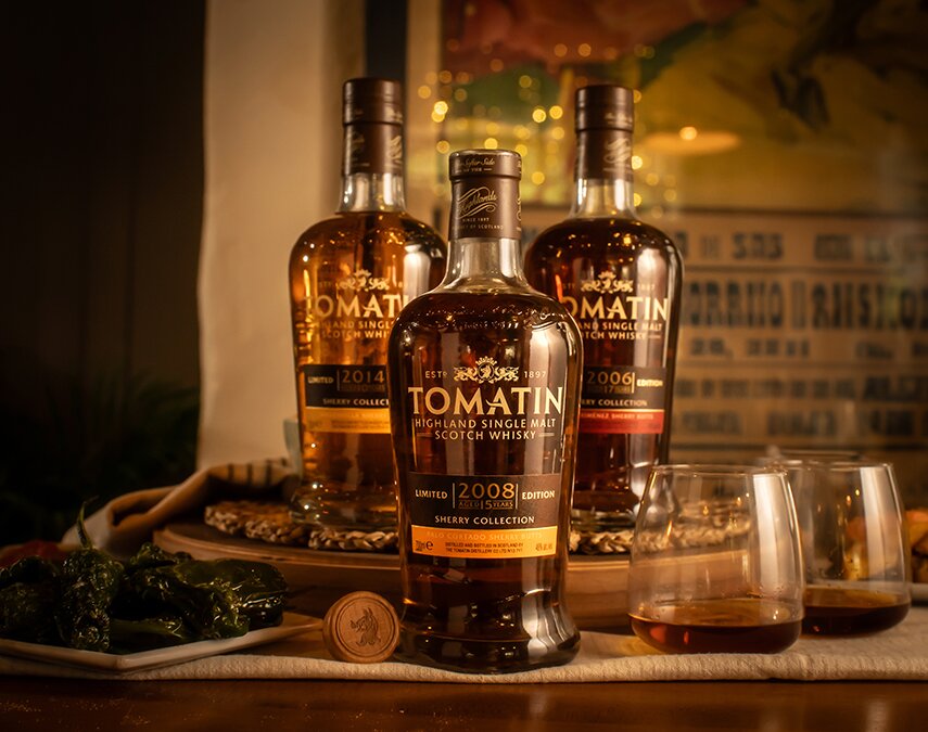 Three bottles of Tomatin whisky
