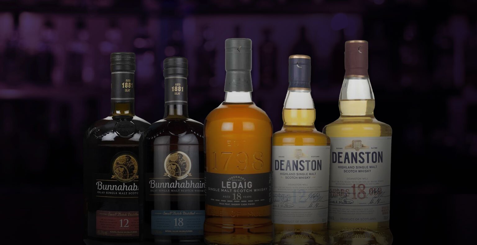 Five bottles of CVH whisky in a hamper.