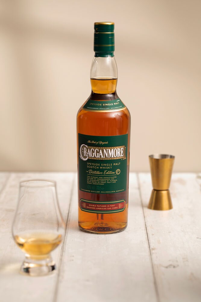 Cragganmore Distillers Edition whisky bottle with Glencairn glass and jigger
