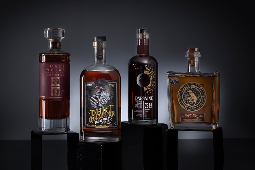 Four bottles of newly releases spirits.