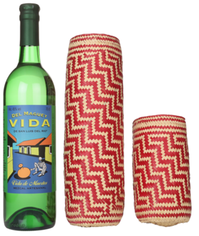 A bottle of Del Maguey Mezcal Vida de Muertos and its free gift bottle sleeve.