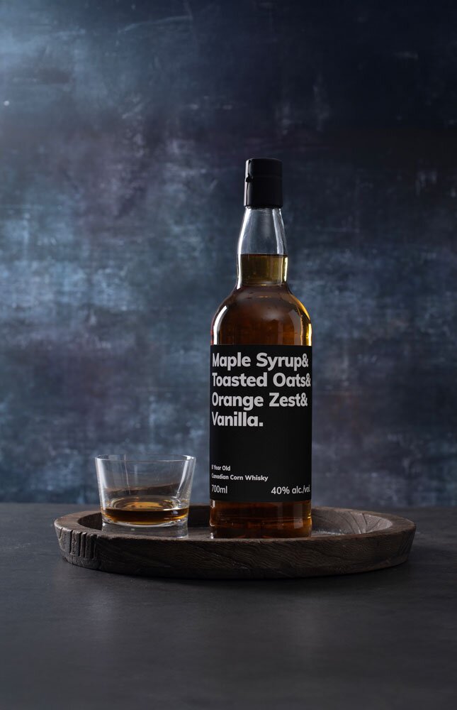 Maple Syrup & Toasted Oats & Orange Zest & Vanilla 8 Year Old whisky bottle with glass