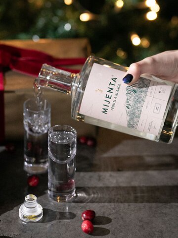 A bottle of Mijenta Tequila Blanco