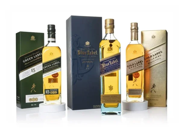 A bottle of Johnnie Walker Gold Label Reserve, Johnnie Walker Blue Label and Johnnie Walker Green Label 15 Year Old.