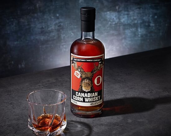 A bottle of TBWC Canadian Corn Whisky
