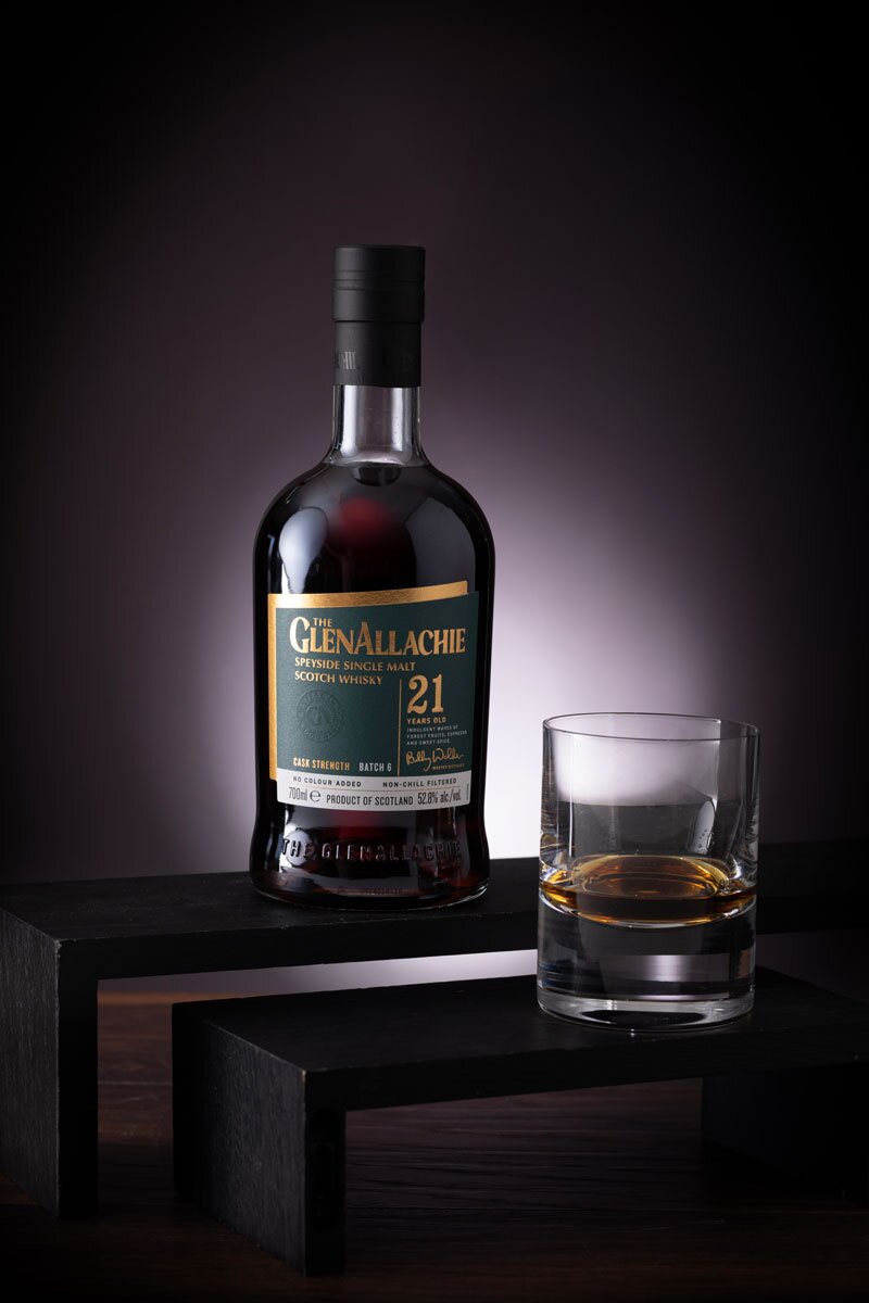 GlenAllachie 21 Year Old Batch Six whisky bottle with tumbler