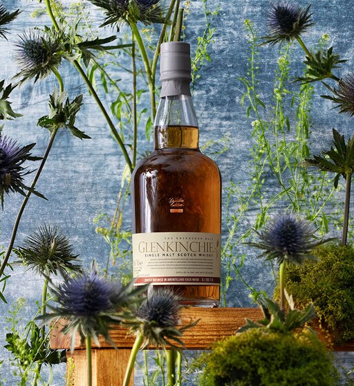 A bottle of Glenkinchie 2007 (bottled 2019) Amontillado Cask Finish - Distillers Edition surrounded by thistles. 