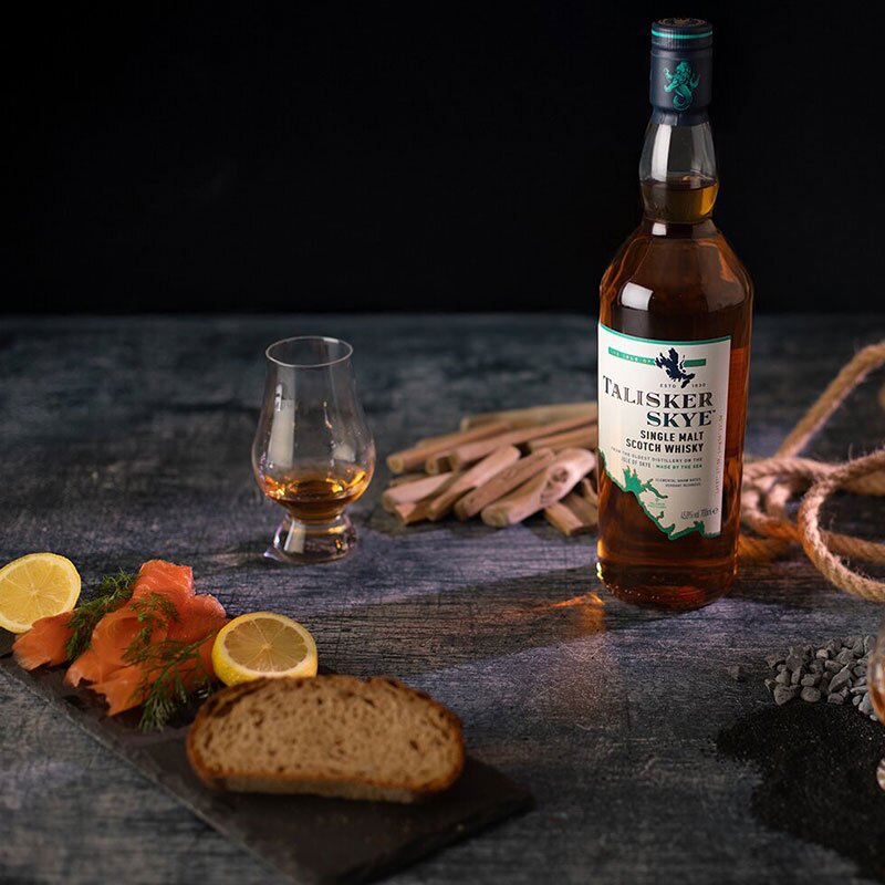 A bottle of Talisker Skye with smoked salmon and rye sourdough