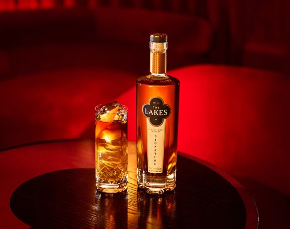 A bottle of The Lakes Signature Single Malt with their signature Fine Line cocktail.
