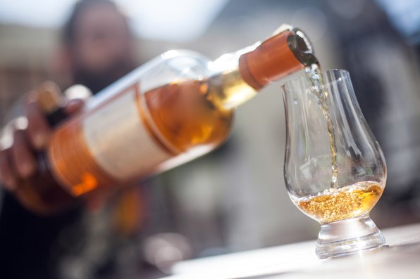 Whisky pour into glass.