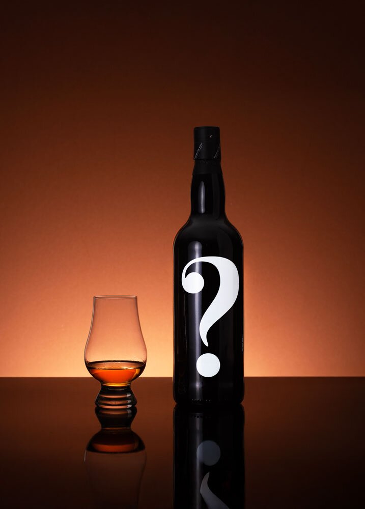 Mystery Malt #5 (Thompson Bros.) whisky bottle with tasting glass