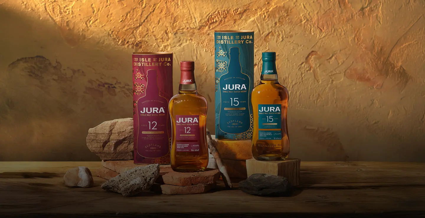 Three bottles of Jura against a rocking background.
