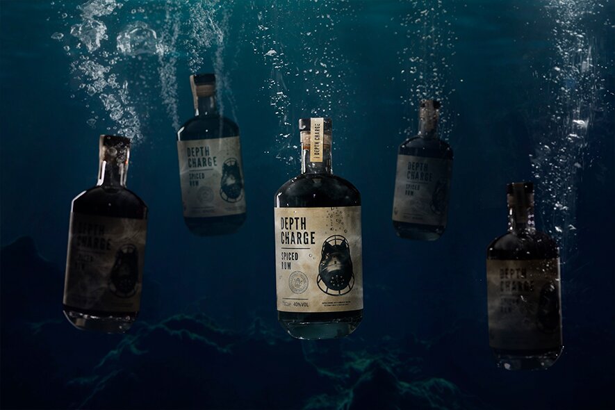 Depth Charge rum sinking down in the sea.