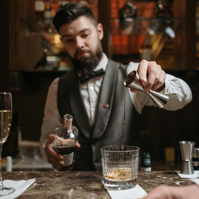 Bartender creating a cocktail