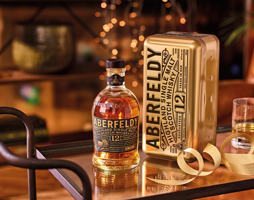 A bottle of Aberfeldy 12 Year Old with Gold Bar Tin.