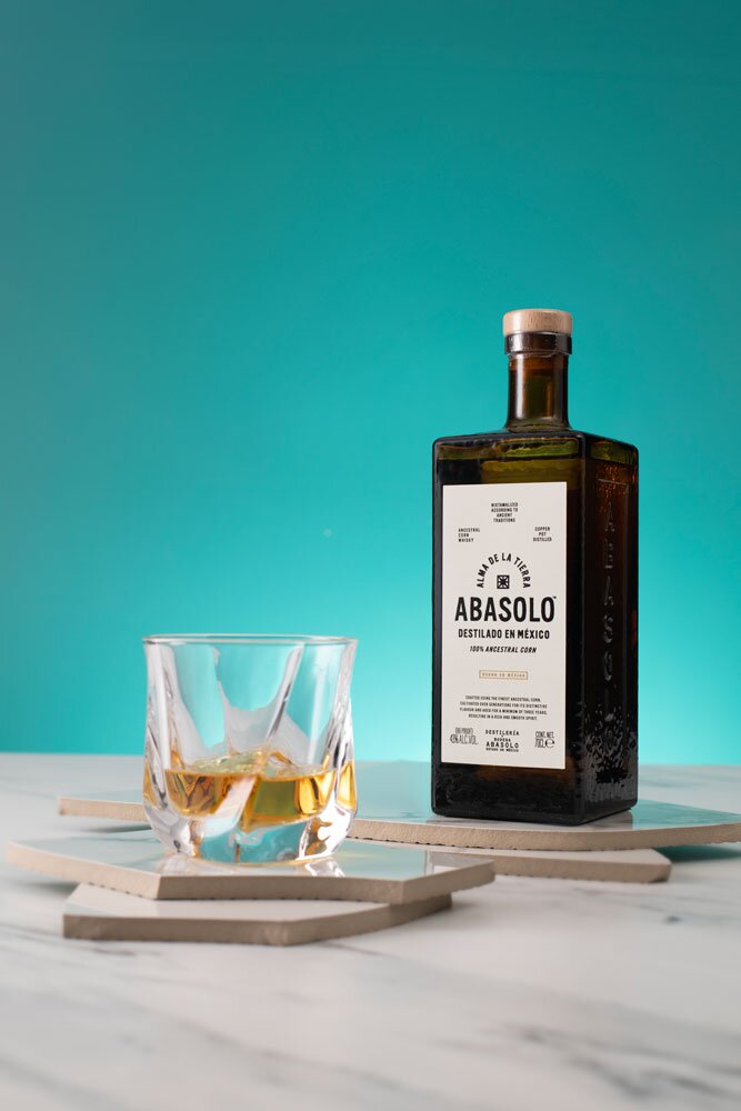 Abasolo whisky bottle with glass