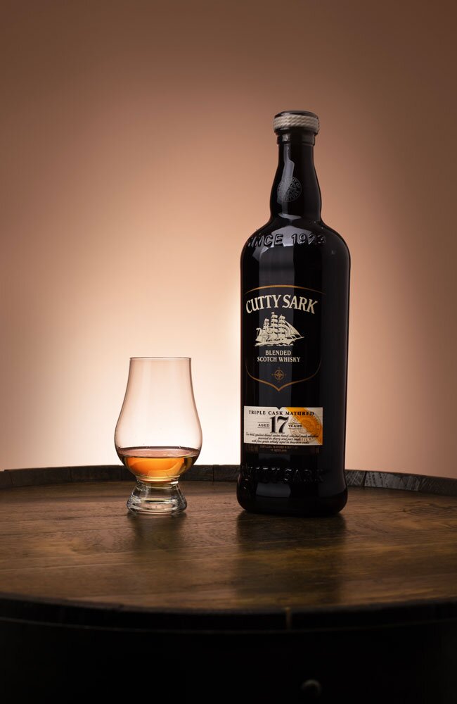 Cutty Sark 17 Year Old whisky bottle with tasting glass
