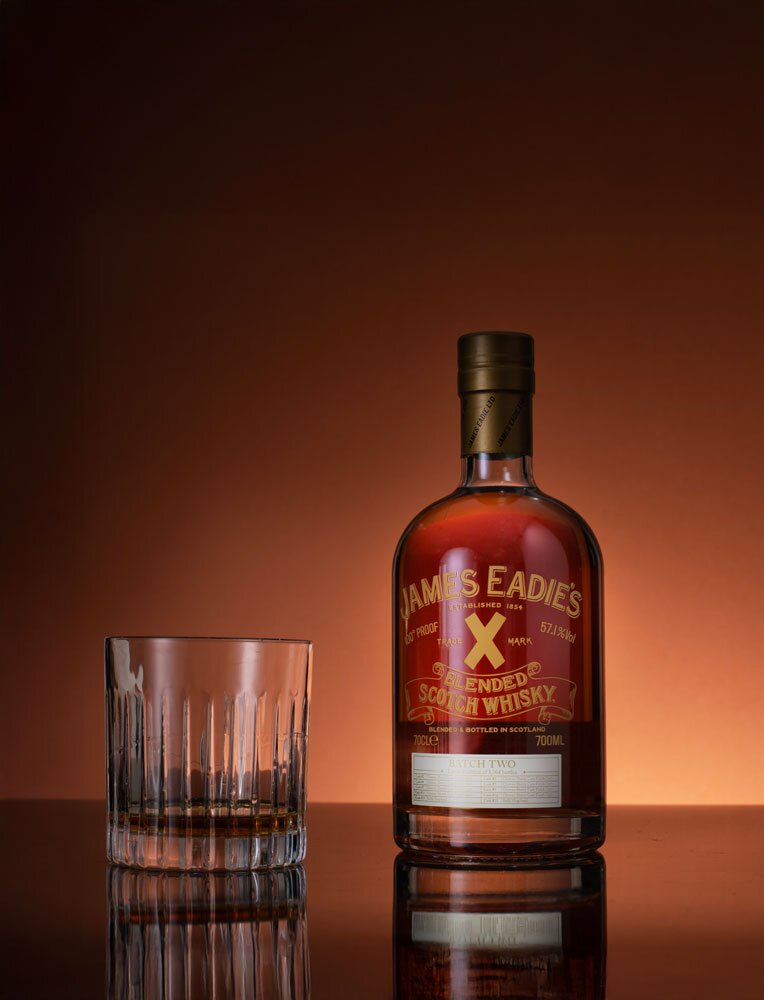 James Eadie's Trade Mark X 100 Proof Batch Two whisky bottle with glass