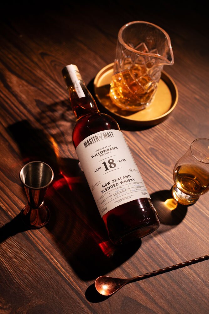 Willowbank 18 Year Old (Master of Malt) whiskey bottle with glass and barware