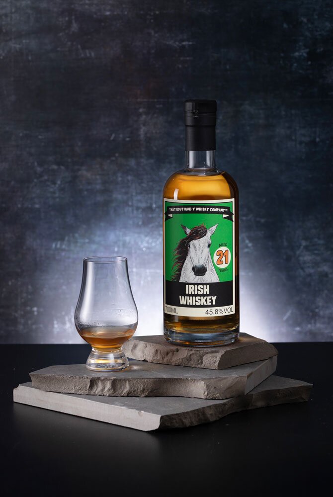 Retribution English whisky bottle and curved whisky glass