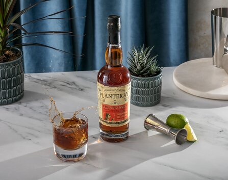 A bottle of Whitley Neill Distillers Cut with a Gin & Tonic.