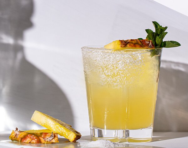 A Patrón Perfect Pineapple Margarita cocktail.