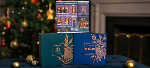 Gin advent calendars with drams and glasses of gin.