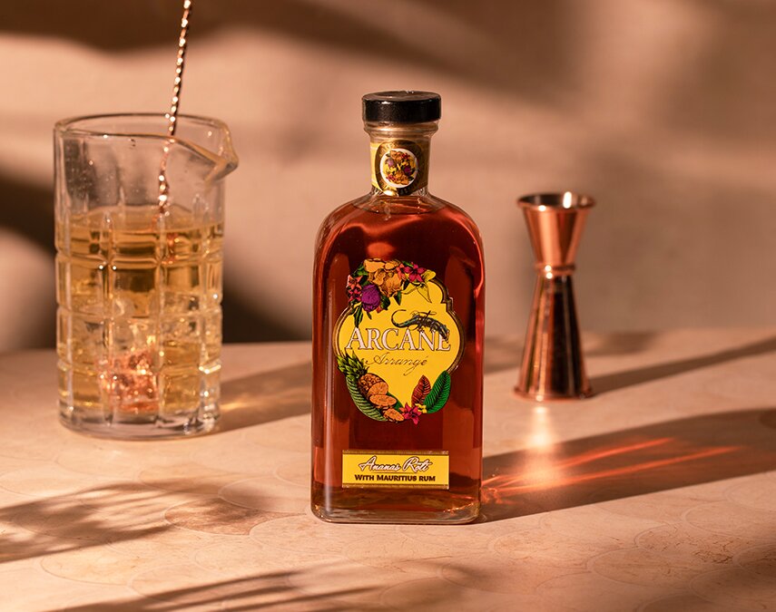 A bottle of The Arcane Arrangé Ananas Roti.