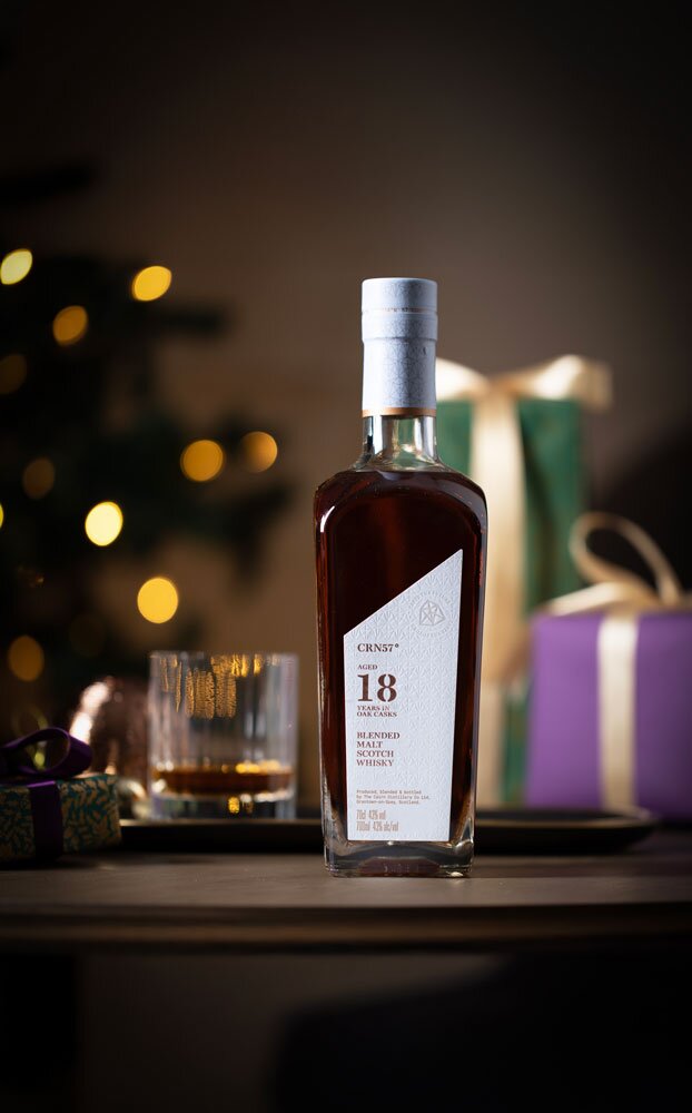 CRN57 18 Year Old Blended Malt whisky bottle with Christmas background