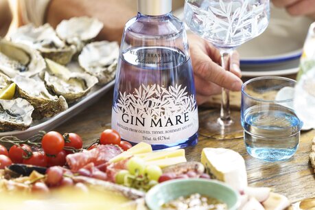 A bottle of Gin Mare and food pairing 