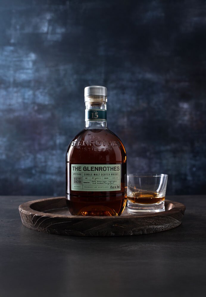 The Glenrothes 15 Year Old whisky bottle with glass