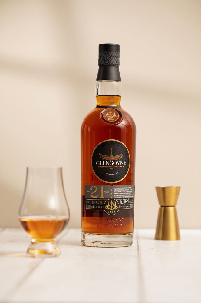 Glengoyne 21 Year Old whisky bottle with Glencairn glass and jigger