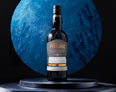 A bottle of Port Askaig 8 Year Old Whisky.