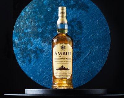 A bottle of Amrut Single Malt whisky.