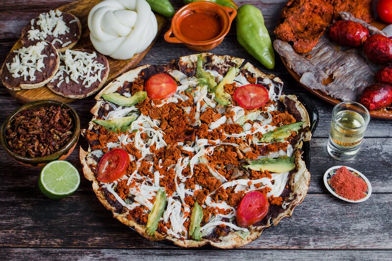 Mezcal being served with food