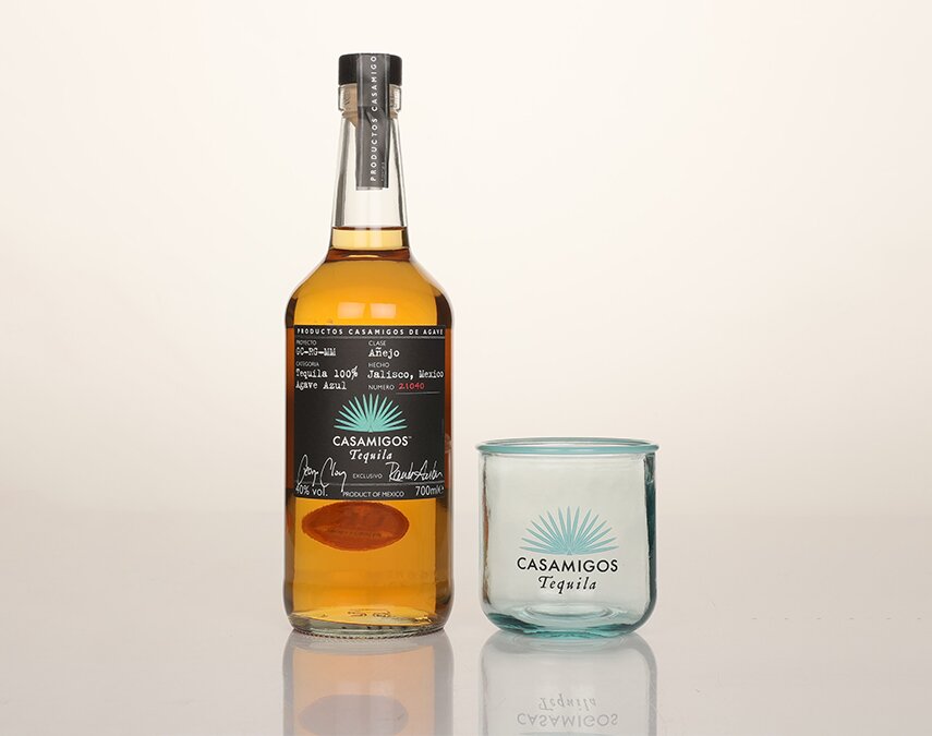 A bottle of Casamigos Añejo Tequila with branded glass