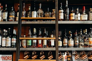 A bar with a selection of bottles