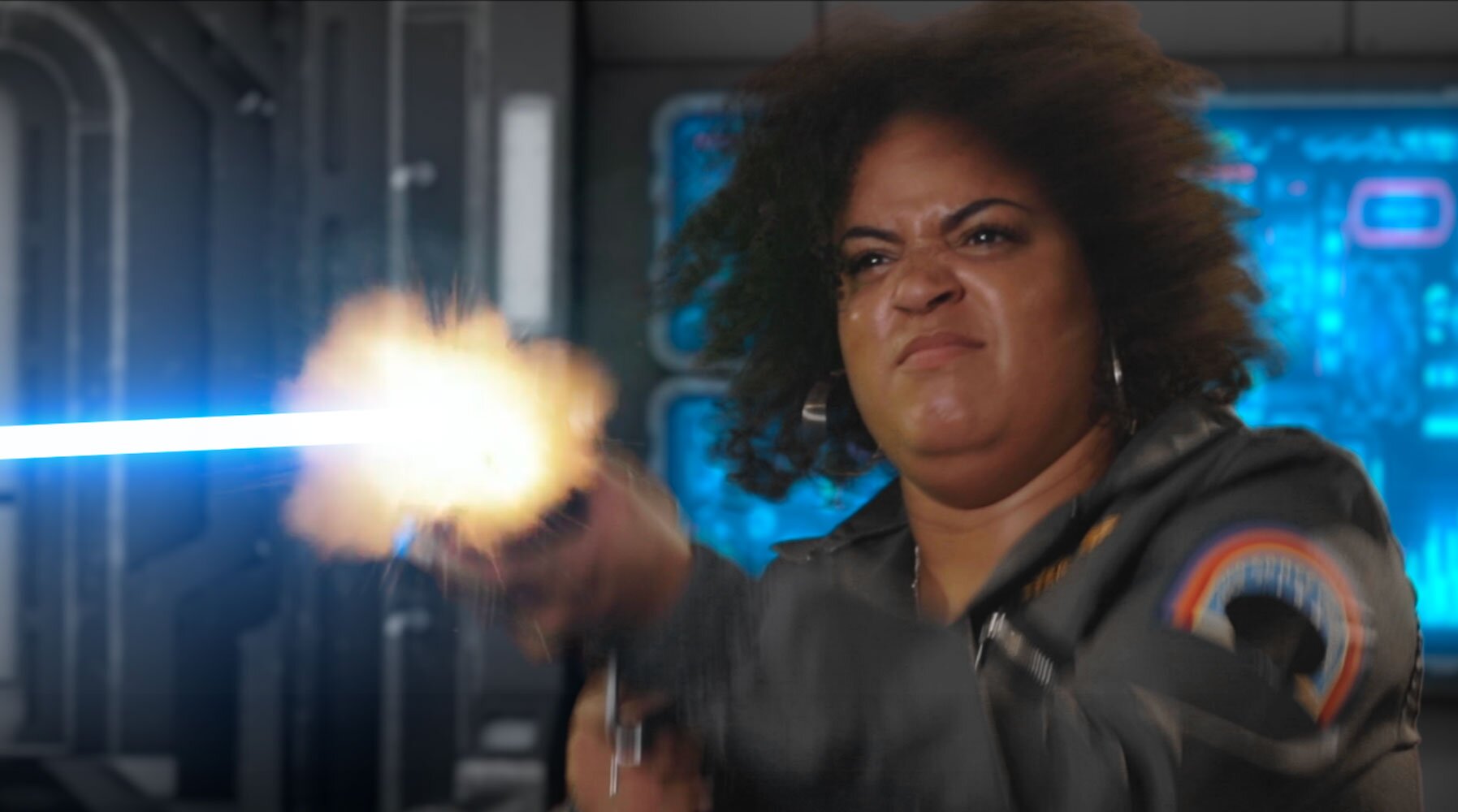Lois firing a laser gun in an old sci-fi competition video