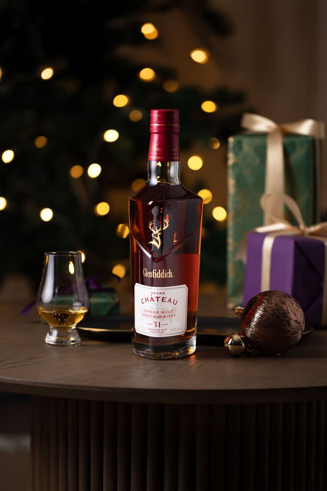 Glenfiddich Grand Château 31 Year Old  bottle with Christmas background