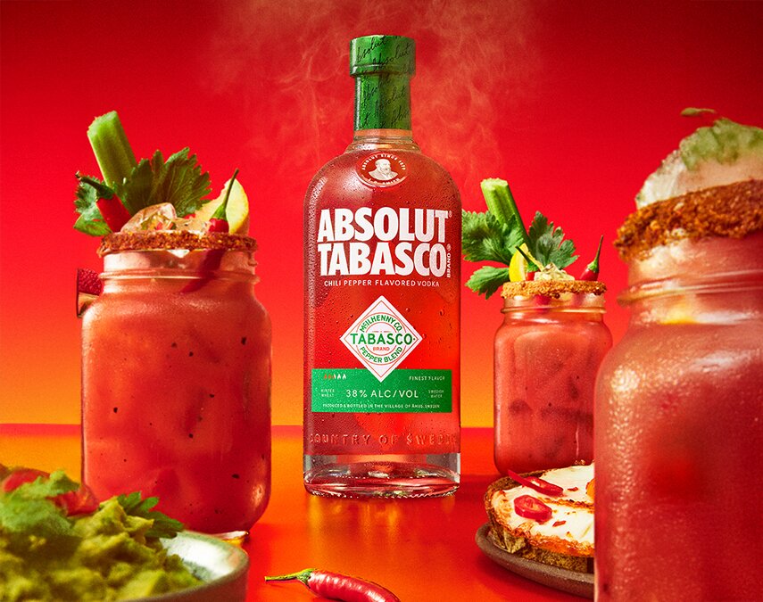 A bottle of Absolut Tabasco and a bloody mary cocktail.