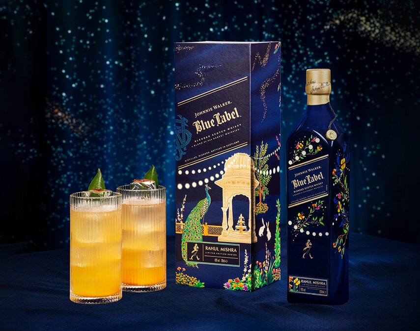 A bottle of Johnnie Walker Blue Label X Rahul Mishra Diwali Limited Edition and cocktails.